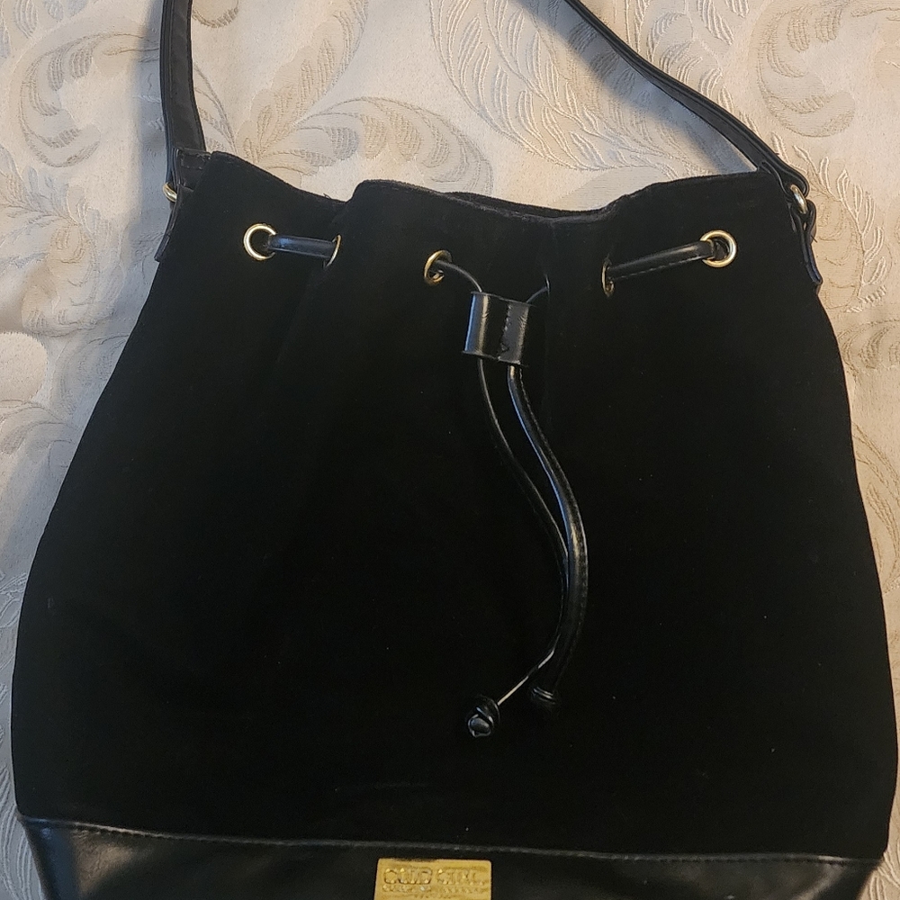 Carolina Herrera good girl black velvet drawstring bag.